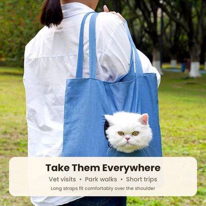 Plain denim pet carrier tote carried on the shoulder