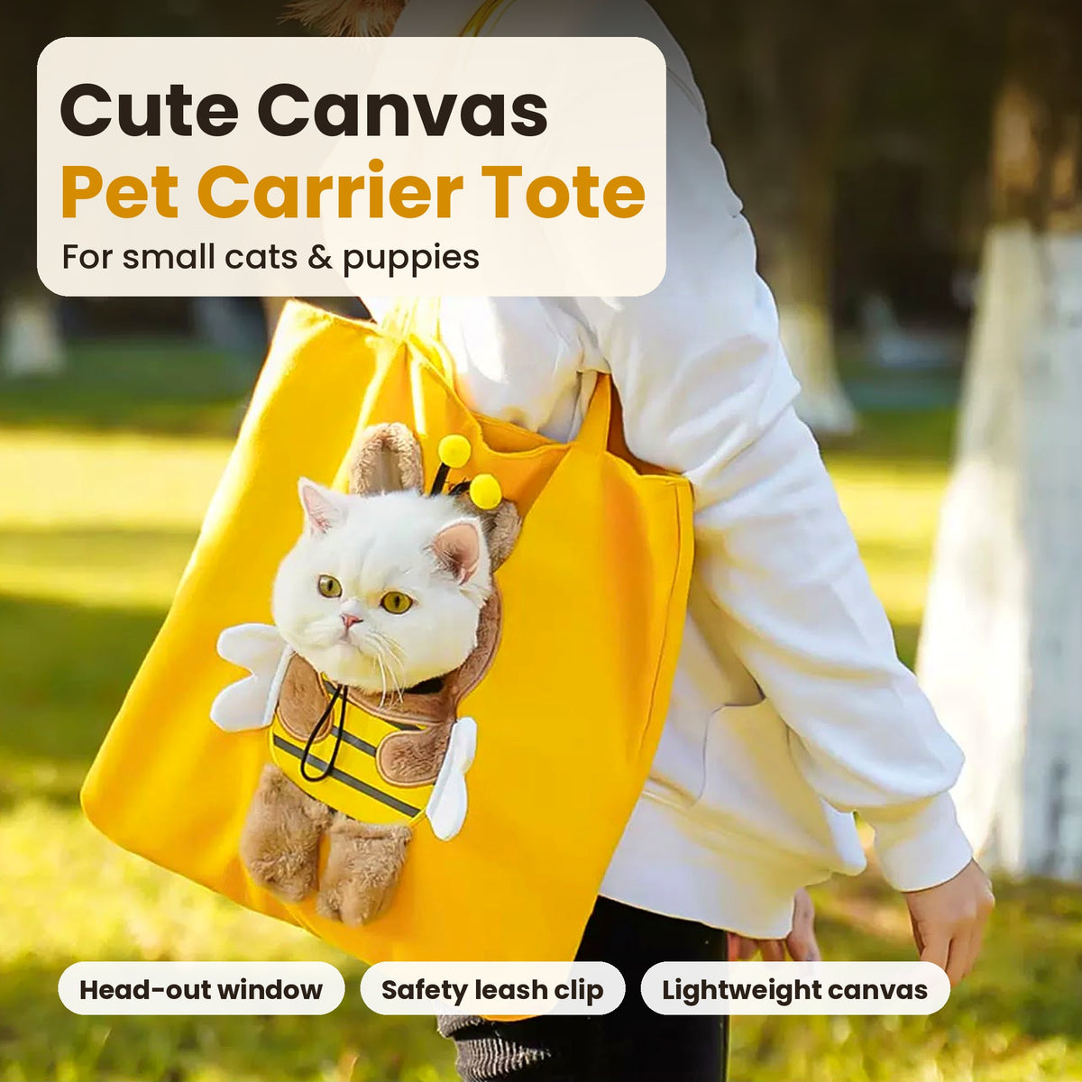 WagCarry canvas pet carrier tote with cat peeking out
